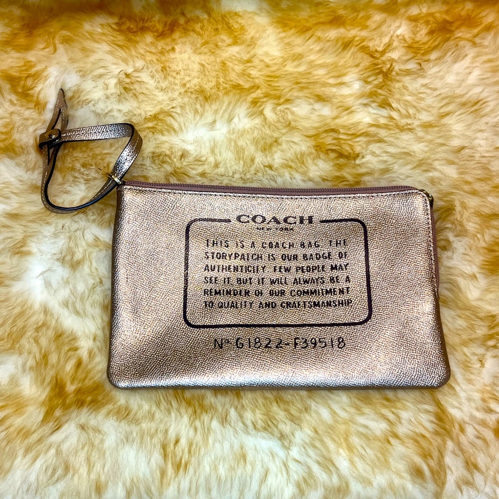 COACH Metallic Rose Gold Leather Wristlet Clutch